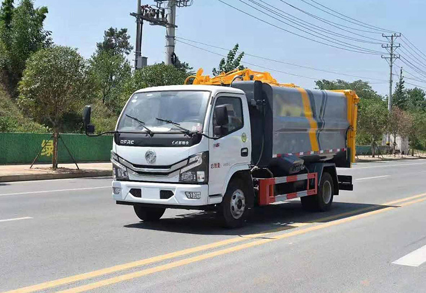 東風(fēng)多利卡壓縮垃圾車(chē)左側(cè)展示圖