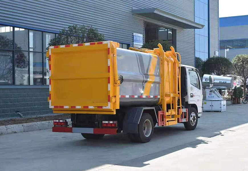 東風(fēng)多利卡壓縮垃圾車(chē)后方位圖